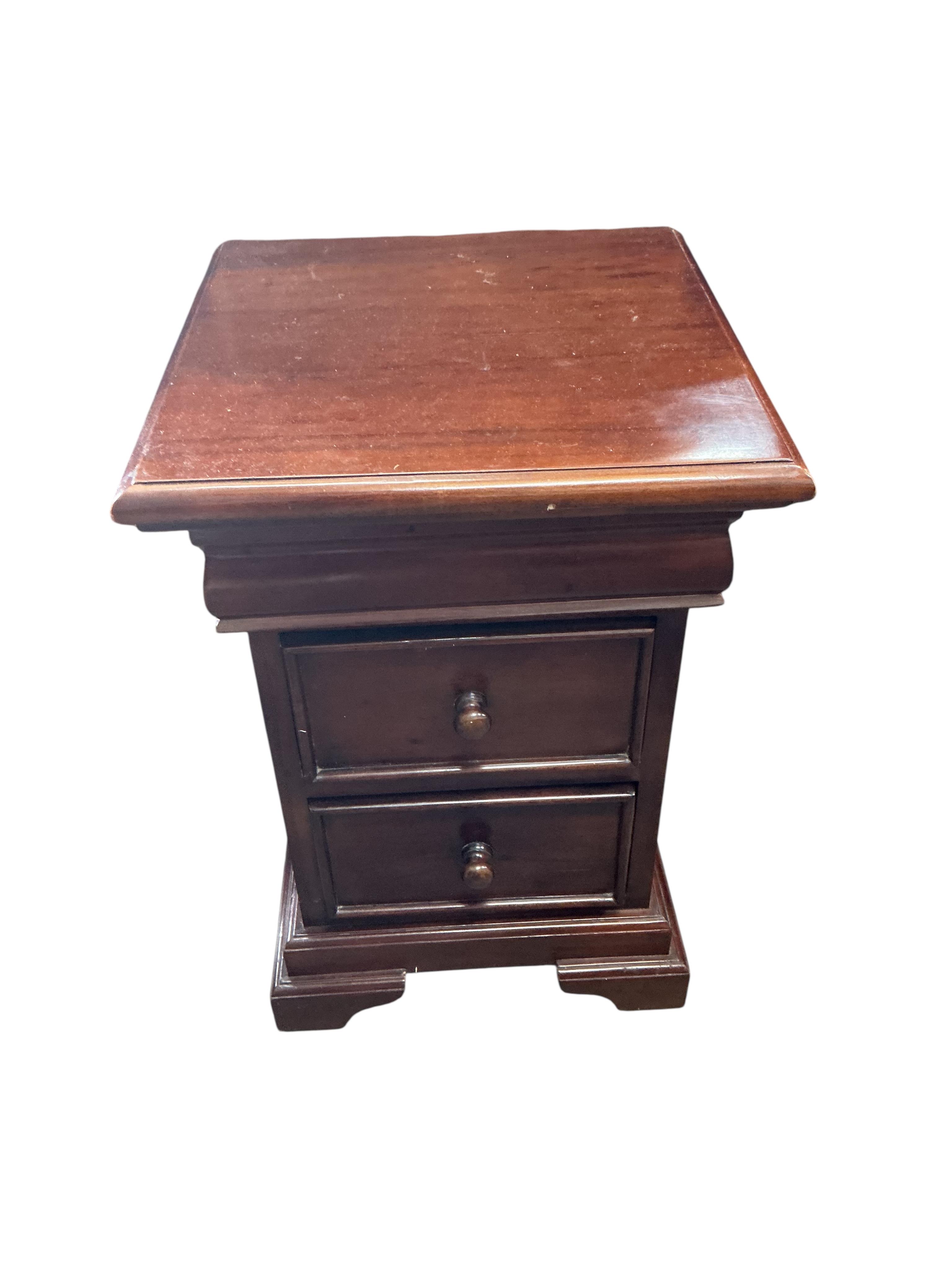 A pair of reproduction mahogany bedside chests, width 45cm, depth 45cm, height 65cm